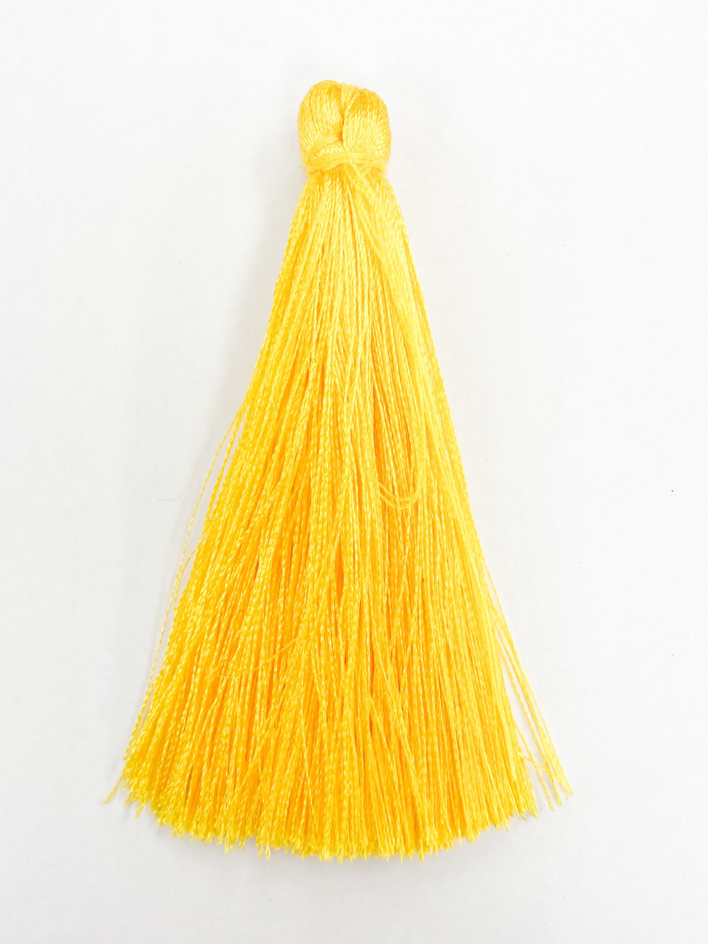 Yellow Coloured Tassel, 65mmL x 10mm. Polyester fibre.