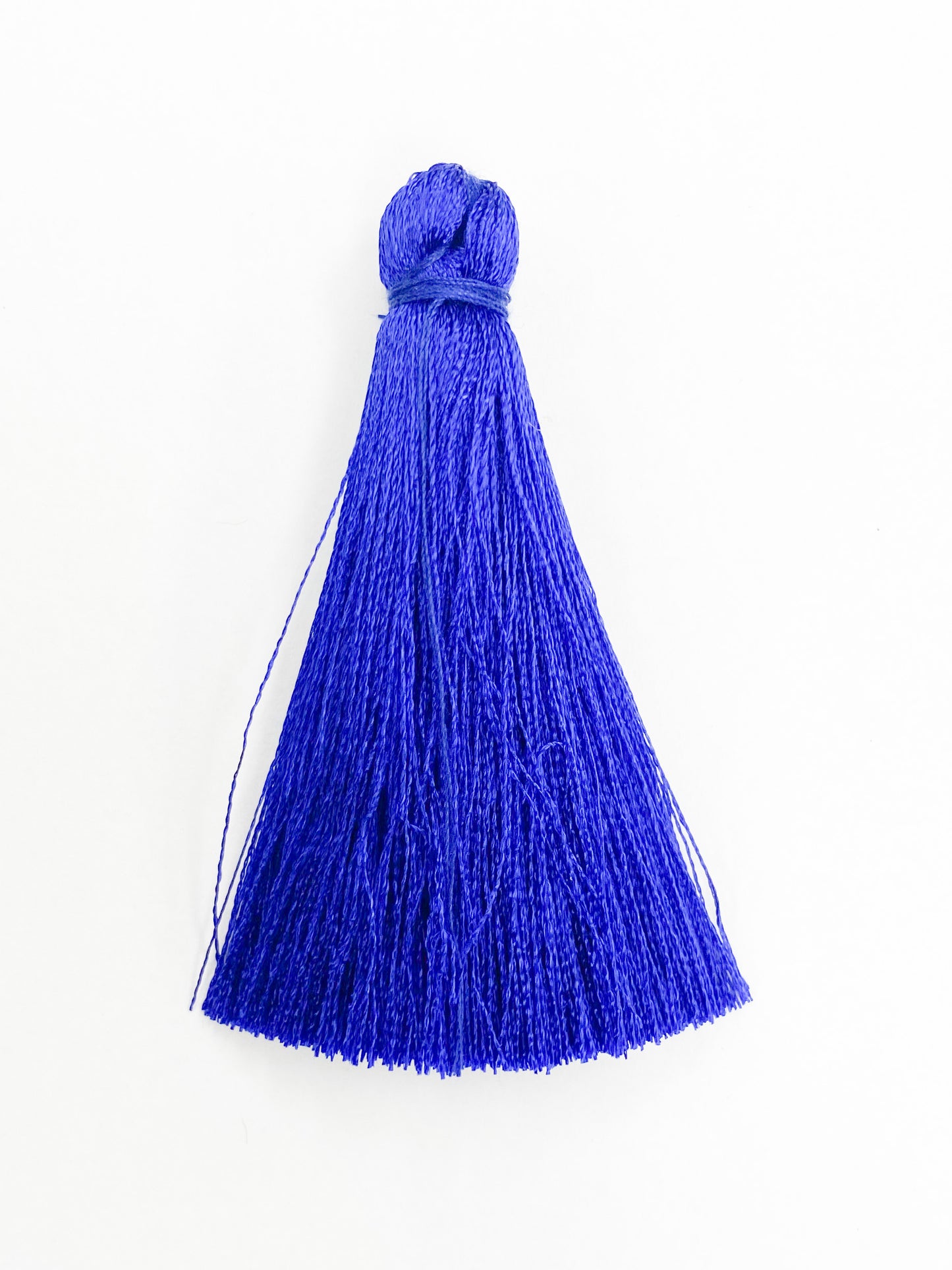 Dark Blue Coloured Tassel, 65mmL x 10mm. Polyester fibre.